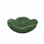 A quirky glazed earthenware dish in the form of a cabbage leaf - a humble homage to nature for food lovers.
